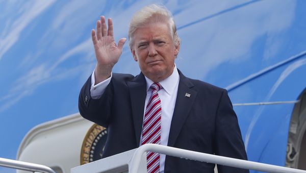 President Donald Trump waves as he arrives on Air Force One at Philadelphia International Airport President Donald Trump waves as he arrives on Air Force One at Philadelphia International Airport - Sputnik International