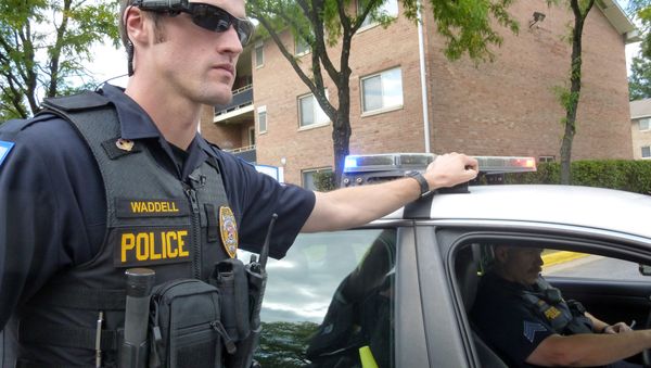 Laurel, Maryland, Police Officer Aaron Waddell shows on September 17, 2014, how the Laurel Police Department has been using body-cameras during patrols. - Sputnik International