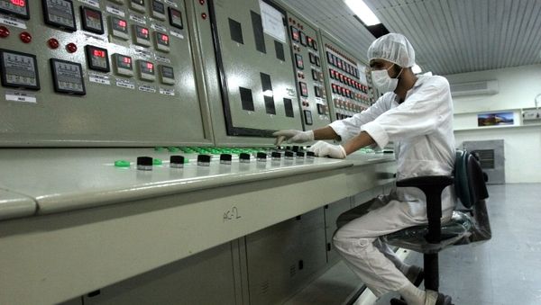 In this Saturday, Feb. 3, 2007 file photo, an Iranian technician works at the Uranium Conversion Facility just outside the city of Isfahan 255 miles (410 kilometers) south of the capital Tehran, Iran In this Saturday, Feb. 3, 2007 file photo, an Iranian technician works at the Uranium Conversion Facility just outside the city of Isfahan 255 miles (410 kilometers) south of the capital Tehran, Iran - Sputnik International