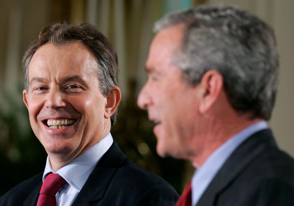 US President George W. Bush (R) and British Prime Minister Tony Blair attend a news conference in the East Room of the White House in Washington November 12, 2004. US President George W. Bush (R) and British Prime Minister Tony Blair attend a news conference in the East Room of the White House in Washington November 12, 2004. - Sputnik International