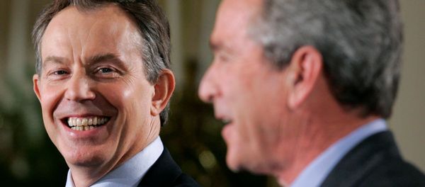 US President George W. Bush (R) and British Prime Minister Tony Blair attend a news conference in the East Room of the White House in Washington November 12, 2004. US President George W. Bush (R) and British Prime Minister Tony Blair attend a news conference in the East Room of the White House in Washington November 12, 2004. - Sputnik International