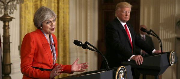 British Prime Minister Theresa May speaks as US President Donald Trump listens during their joint news conference at the White House in Washington, US, January 27, 2017 - Sputnik International