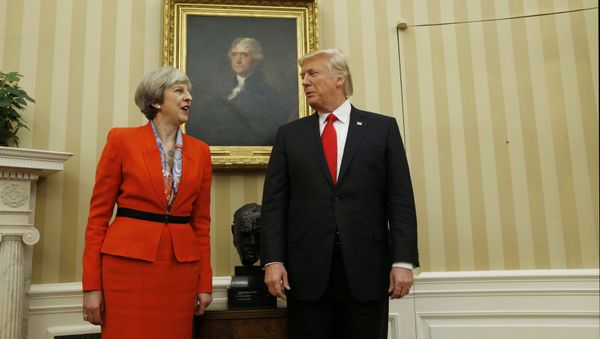 U.S. President Donald Trump speaks with British Prime Minister Theresa May in the Oval Office of the White House in Washington January 27, 201 U.S. President Donald Trump speaks with British Prime Minister Theresa May in the Oval Office of the White House in Washington January 27, 201 - Sputnik International