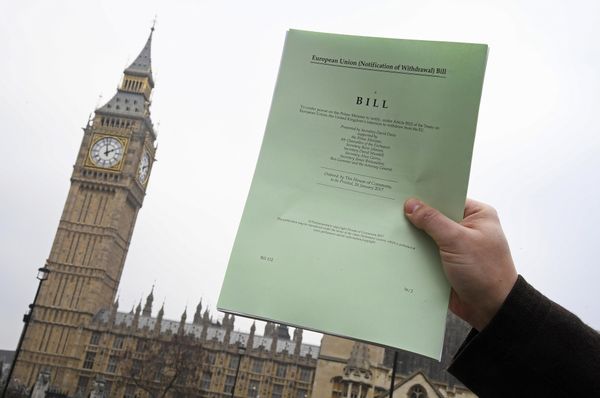 A journalist poses with a copy of the Brexit Article 50 bill, introduced by the government to seek parliamentary approval to start the process of leaving the European Union, in front of the Houses of Parliament in London, Britain, January 26, 2017 A journalist poses with a copy of the Brexit Article 50 bill, introduced by the government to seek parliamentary approval to start the process of leaving the European Union, in front of the Houses of Parliament in London, Britain, January 26, 2017 - Sputnik International