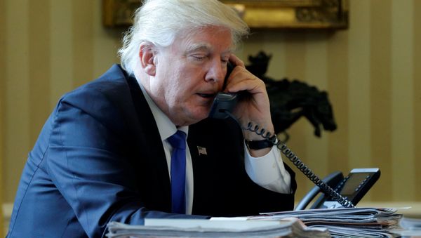 U.S. President Donald Trump speaks by phone with Russia's President Vladimir Putin in the Oval Office at the White House in Washington, U.S. January 28, 2017 U.S. President Donald Trump speaks by phone with Russia's President Vladimir Putin in the Oval Office at the White House in Washington, U.S. January 28, 2017 - Sputnik International