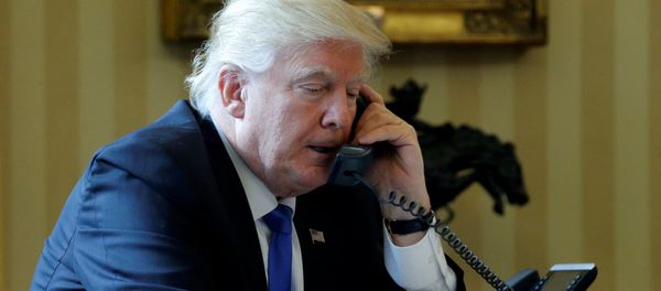 U.S. President Donald Trump speaks by phone with Russia's President Vladimir Putin in the Oval Office at the White House in Washington, U.S. January 28, 2017 U.S. President Donald Trump speaks by phone with Russia's President Vladimir Putin in the Oval Office at the White House in Washington, U.S. January 28, 2017 - Sputnik International