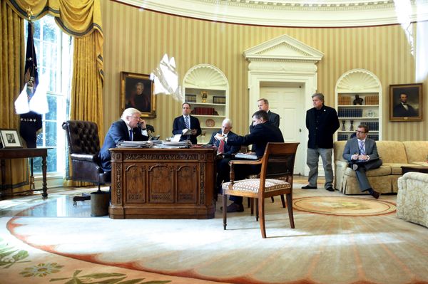 U.S. President Donald Trump (from L), joined by Chief of Staff Reince Priebus, Vice President Mike Pence, National Security Advisor Michael Flynn, Communications Director Sean Spicer and senior advisor Steve Bannon, speaks by phone with Russia's President Vladimir Putin in the Oval Office at the White House in Washington, U.S. January 28, 2017 U.S. President Donald Trump (from L), joined by Chief of Staff Reince Priebus, Vice President Mike Pence, National Security Advisor Michael Flynn, Communications Director Sean Spicer and senior advisor Steve Bannon, speaks by phone with Russia's President Vladimir Putin in the Oval Office at the White House in Washington, U.S. January 28, 2017 - Sputnik International