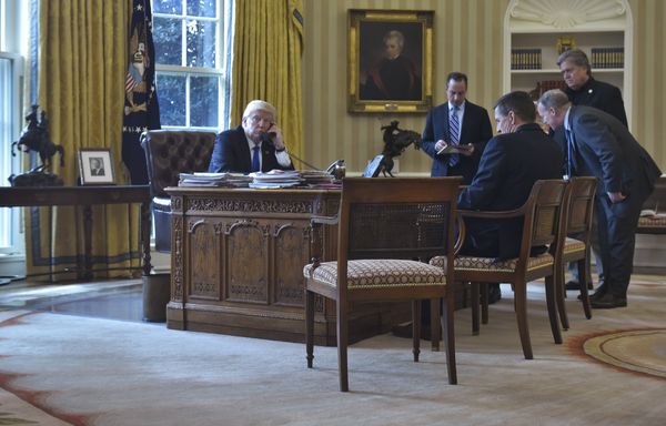 US President Donald Trump speaks on the phone with Russia's President Vladimir Putin from the Oval Office of the White House on January 28, 2017, in Washington, DC US President Donald Trump speaks on the phone with Russia's President Vladimir Putin from the Oval Office of the White House on January 28, 2017, in Washington, DC - Sputnik International