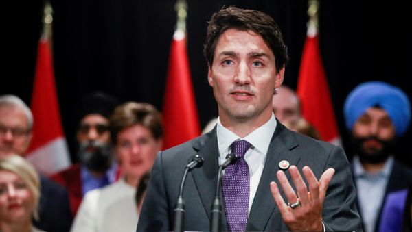 Canada's Prime Minister Justin Trudeau speaks to the media at the end of a two-day cabinet retreat in Calgary, Alberta, Canada January 24, 2017 - Sputnik International