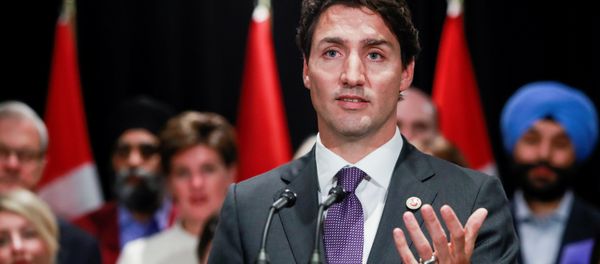Canada's Prime Minister Justin Trudeau speaks to the media at the end of a two-day cabinet retreat in Calgary, Alberta, Canada January 24, 2017 Canada's Prime Minister Justin Trudeau speaks to the media at the end of a two-day cabinet retreat in Calgary, Alberta, Canada January 24, 2017 - Sputnik International