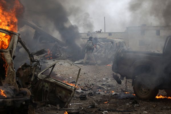 A rebel fighter walks near damaged vehicles after a car bomb explosion in Jub al Barazi east of the northern Syrian town of al-Bab, Syria January 15, 2017 A rebel fighter walks near damaged vehicles after a car bomb explosion in Jub al Barazi east of the northern Syrian town of al-Bab, Syria January 15, 2017 - Sputnik International
