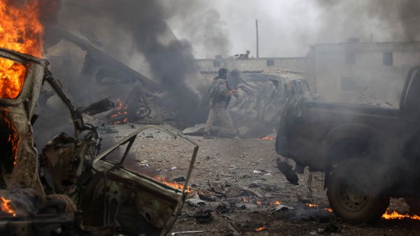 A rebel fighter walks near damaged vehicles after a car bomb explosion in Jub al Barazi east of the northern Syrian town of al-Bab, Syria January 15, 2017 A rebel fighter walks near damaged vehicles after a car bomb explosion in Jub al Barazi east of the northern Syrian town of al-Bab, Syria January 15, 2017 - Sputnik International