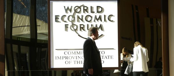 An attendee arrives in the Congress Hall during the World Economic Forum (WEF) annual meeting in Davos, Switzerland January 20, 2017 An attendee arrives in the Congress Hall during the World Economic Forum (WEF) annual meeting in Davos, Switzerland January 20, 2017 - Sputnik International