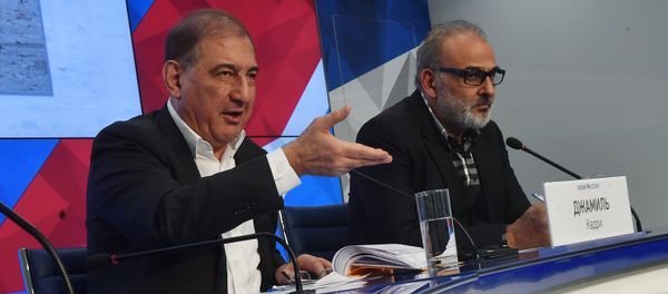 Qadri Jamil, left, chairman of the Syrian opposition's Moscow group, secretary of the People's Will Party and one of the leaders of the Popular Front for Change and Liberation, with Jamal Suleiman, a representative of the Syrian opposition's Cairo group, during a news conference at the Rossiya Segodnya International Multimedia Press Center in Moscow - Sputnik International
