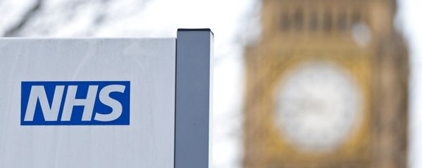 An NHS sign is pictured at St Thomas' Hospital in front of the Big Ben clock face and the Elizabeth Tower on January 13, 2017 in London. An NHS sign is pictured at St Thomas' Hospital in front of the Big Ben clock face and the Elizabeth Tower on January 13, 2017 in London. - Sputnik International