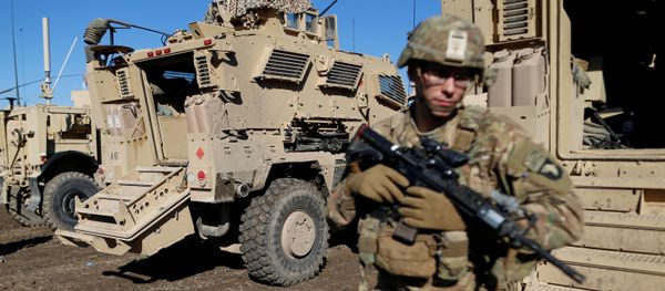 US. army soldiers stand next a military vehicle in the town of Bartella, east of Mosul, Iraq, December 27, 2016 US. army soldiers stand next a military vehicle in the town of Bartella, east of Mosul, Iraq, December 27, 2016 - Sputnik International