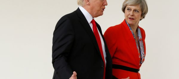 US President Donald Trump escorts British Prime Minister Theresa May after their meeting at the White House in Washington, US, January 27, 2017. US President Donald Trump escorts British Prime Minister Theresa May after their meeting at the White House in Washington, US, January 27, 2017. - Sputnik International