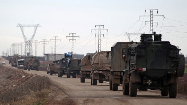 Turkish military vehicles drive in the Syrian rebel-held town of al-Rai, as they head towards the northern Syrian town of al-Bab, Syria January 9, 2017 - Sputnik International