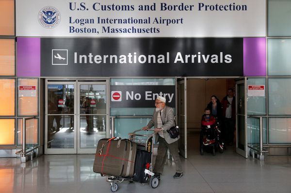 International travelers arrive after U.S. President Donald Trump's executive order travel ban at Logan Airport in Boston, Massachusetts, U.S - Sputnik International