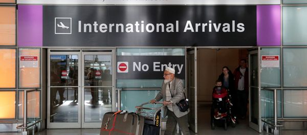 International travelers arrive after U.S. President Donald Trump's executive order travel ban at Logan Airport in Boston, Massachusetts, U.S International travelers arrive after U.S. President Donald Trump's executive order travel ban at Logan Airport in Boston, Massachusetts, U.S - Sputnik International