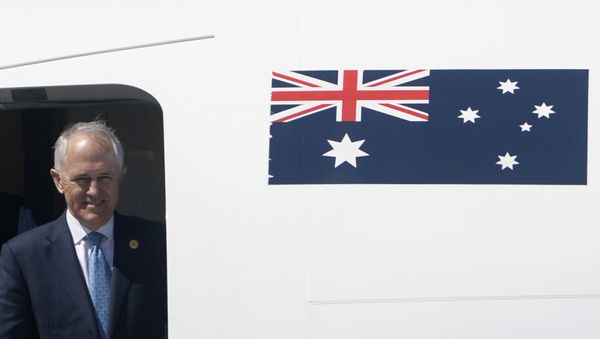Australia's Prime Minister Malcolm Turnbull looks out from his plane upon arrival at the international airport to attend the Asia-Pacific Economic Cooperation (APEC) Summit in Manila on November 17, 2015. - Sputnik International