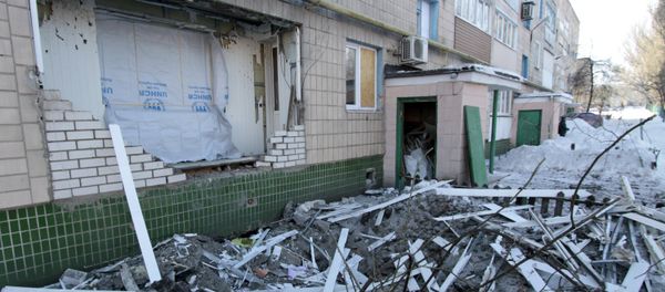 A destroyed balcony of a residential building on Partizanskaya Street in Donetsk, damaged during a shelling by the Ukrainian military A destroyed balcony of a residential building on Partizanskaya Street in Donetsk, damaged during a shelling by the Ukrainian military - Sputnik International