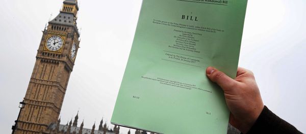 A journalist poses with a copy of the Brexit Article 50 bill, introduced by the government to seek parliamentary approval to start the process of leaving the European Union, in front of the Houses of Parliament in London, Britain, January 26, 2017. A journalist poses with a copy of the Brexit Article 50 bill, introduced by the government to seek parliamentary approval to start the process of leaving the European Union, in front of the Houses of Parliament in London, Britain, January 26, 2017. - Sputnik International