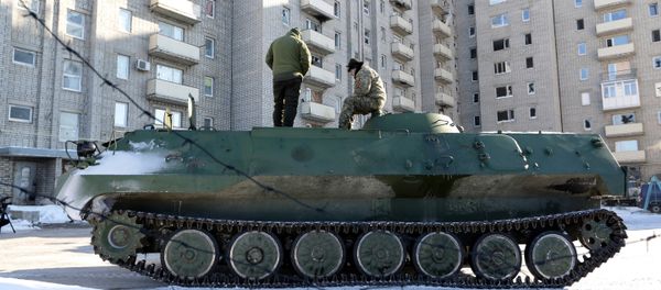Ukrainian medical servicemen stand on an Armoured Personnel Carriers (APC) after they carried wounded servicemen to hospital in Ukraine-controlled town of Avdiivka, in Donetsk region Ukrainian medical servicemen stand on an Armoured Personnel Carriers (APC) after they carried wounded servicemen to hospital in Ukraine-controlled town of Avdiivka, in Donetsk region - Sputnik International