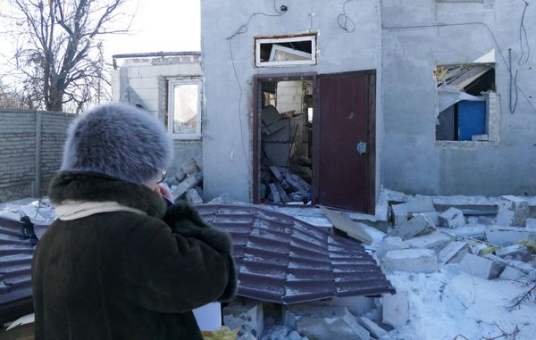 A woman by a house damaged by the shelling of the Ukrainian army in Makeevka, Donetsk Region. File photo A woman by a house damaged by the shelling of the Ukrainian army in Makeevka, Donetsk Region. File photo - Sputnik International