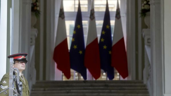 A Maltese army soldier stands in front of the main gate of the the Auberge de Castille palace, Premier's office, on the eve of an EU Summit, in Valletta, Malta - Sputnik International
