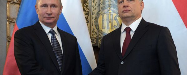 Hungarian Prime Minister Viktor Orban (R) and Russian President Vladimir Putin attend a news conference following their talks in Budapest, Hungary - Sputnik International