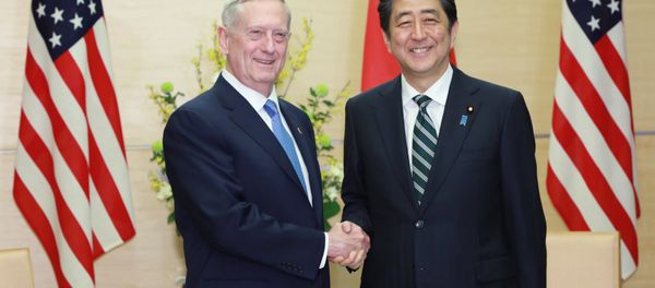U.S. Defense Secretary Jim Mattis (L) and Japanese Prime Minister Shinzo Abe (R) shake hands at the prime minister's office in Tokyo, Japan U.S. Defense Secretary Jim Mattis (L) and Japanese Prime Minister Shinzo Abe (R) shake hands at the prime minister's office in Tokyo, Japan - Sputnik International