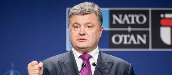 Ukraine's President Petro Poroshenko attends a joint press conference with the NATO Secretary General after a NATO Summit session on Ukraine during the second day of a NATO Summit in Warsaw, Poland on July 9, 2016 Ukraine's President Petro Poroshenko attends a joint press conference with the NATO Secretary General after a NATO Summit session on Ukraine during the second day of a NATO Summit in Warsaw, Poland on July 9, 2016 - Sputnik International