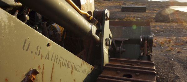In this file photo dated Aug. 16, 2005, an abandoned US Air Force vehicle is seen on Aug. 16, 2005, outside the eastern Greenland settlement of Kulusuk where there used to be a U.S. Air Force base as part of an early warning radar system In this file photo dated Aug. 16, 2005, an abandoned US Air Force vehicle is seen on Aug. 16, 2005, outside the eastern Greenland settlement of Kulusuk where there used to be a U.S. Air Force base as part of an early warning radar system - Sputnik International