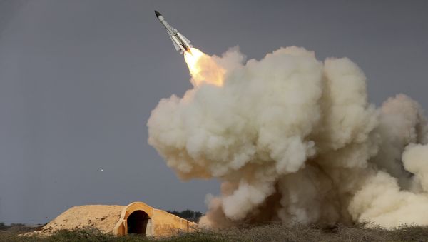FILE -- In this Dec. 29, 2016 file photo, released by the semi-official Iranian Students News Agency (ISNA), a long-range S-200 missile is fired in a military drill in the port city of Bushehr, on the northern coast of Persian Gulf, Iran - Sputnik International