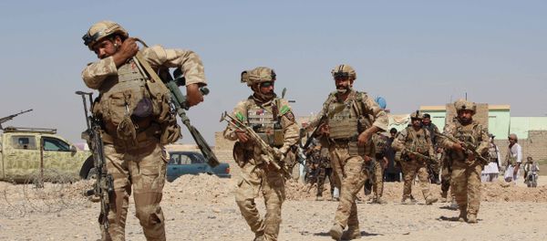 Afghan National Army commandos take position during a military operation in Helmand province (File) - Sputnik International