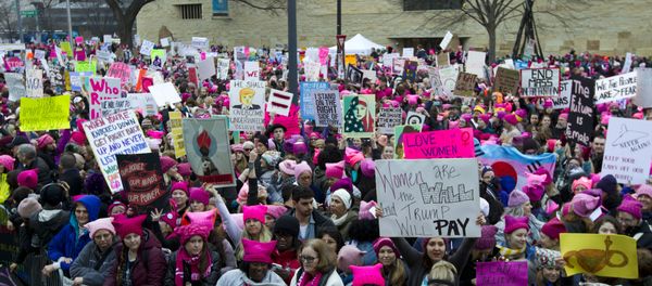 Women with bright pink hats and signs begin to gather for a protest against Donald Trump's presidency, Saturday, Jan. 21, 2017 in Washington, DC. Earlier this year, US media reported that Soros contributed $246 million to partners of the Women's March. - Sputnik International