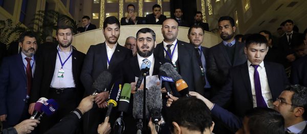 Mohammed Alloush, head of a Syrian opposition delegation, center, speaks to the media after the talks on Syrian peace in Astana, Kazakhstan, Tuesday, Jan. 24, 2017 Mohammed Alloush, head of a Syrian opposition delegation, center, speaks to the media after the talks on Syrian peace in Astana, Kazakhstan, Tuesday, Jan. 24, 2017 - Sputnik International