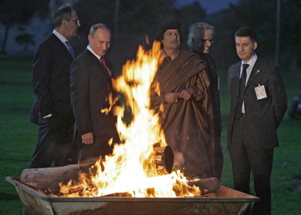 Russian President Vladimir Putin and Foreign Minister Sergei Larvov during a visit with Libyan leader Muammar Gaddafi in 2008 - Sputnik International