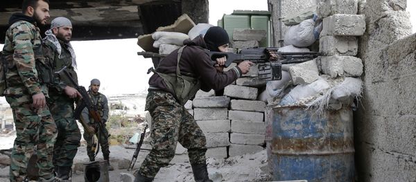 In this Monday, Dec. 5, 2016 photo, Syrian army soldiers fire their weapons during a battle with insurgents at the Ramouseh front line, east of Aleppo, Syria In this Monday, Dec. 5, 2016 photo, Syrian army soldiers fire their weapons during a battle with insurgents at the Ramouseh front line, east of Aleppo, Syria - Sputnik International