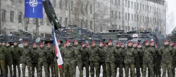 Netherlands' soldiers attend a ceremony to welcome the German battalion being deployed to Lithuania as part of NATO deterrence measures against Russia in Rukla, Lithuania February 7, 2017 Netherlands' soldiers attend a ceremony to welcome the German battalion being deployed to Lithuania as part of NATO deterrence measures against Russia in Rukla, Lithuania February 7, 2017 - Sputnik International