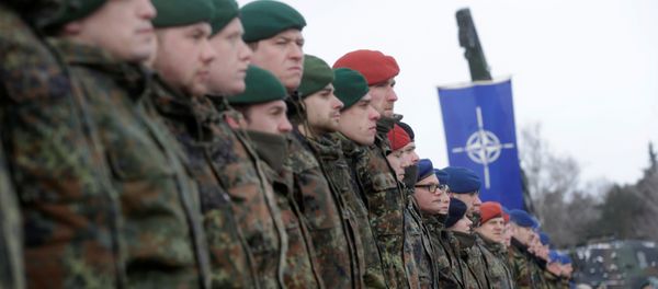 German soldiers attend a ceremony to welcome the German battalion being deployed to Lithuania as part of NATO deterrence measures against Russia in Rukla, Lithuania February 7, 2017 German soldiers attend a ceremony to welcome the German battalion being deployed to Lithuania as part of NATO deterrence measures against Russia in Rukla, Lithuania February 7, 2017 - Sputnik International