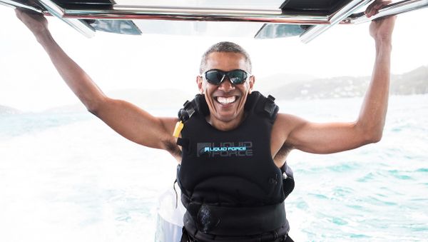Former U.S. President Barack Obama sits on a boat during a kite surfing outing with British businessman Richard Branson during his holiday on Branson's Moskito island, in the British Virgin Islands - Sputnik International
