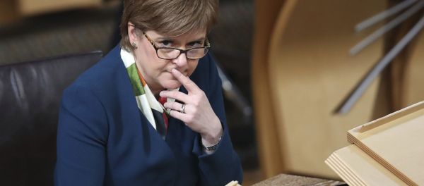 Scotland's First Minister Nicola Sturgeon sits in the main chamber of the Scottish Parliament in Edinburgh, Scotland Tuesday Jan. 17, 2017 ahead of the vote on the Scottish Government's plans to keep Scotland in the European single market even if the rest of the Britain leaves. - Sputnik International