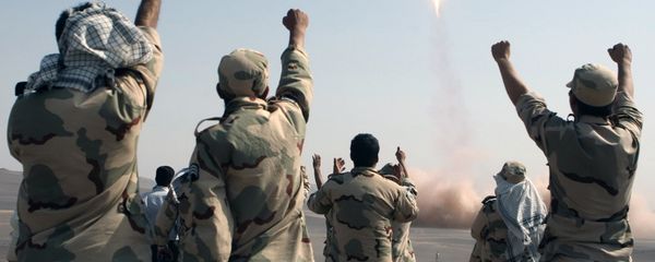 In this photo released by the Islamic Republic News Agency (IRNA), members of the Iranian Revolutionary Guard celebrate after launching a missile during their maneuver in an undisclosed location in Iran, Tuesday, July 3, 2012. Iran's powerful Revolutionary Guards test fired several ballistic missiles on Tuesday, including a long-range variety capable of hitting U.S. bases in the region as well as Israel, Iranian media reported.THE ASSOCIATED PRESS HAS NO WAY OF INDEPENDENTLY VERIFYING THE CONTENT, LOCATION OR DATE OF THIS IMAGE. - Sputnik International