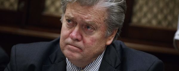 White House chief strategist Steve Bannon listens as President Donald Trump speaks during a meeting with county sheriffs in the Roosevelt Room of the White House in Washington - Sputnik International