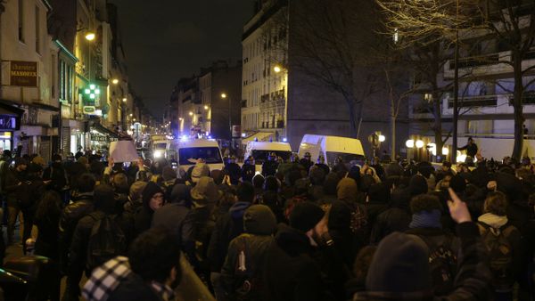 Police block a street as people gather to protest against an alleged police assault on a black man while in custody in central Paris Police block a street as people gather to protest against an alleged police assault on a black man while in custody in central Paris - Sputnik International