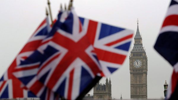 Union flags displayed on a tourist stall, backdropped by the Houses of Parliament and Elizabeth Tower containing the bell know as Big Ben, in London, Wednesday, February 8, 2017. Union flags displayed on a tourist stall, backdropped by the Houses of Parliament and Elizabeth Tower containing the bell know as Big Ben, in London, Wednesday, February 8, 2017. - Sputnik International