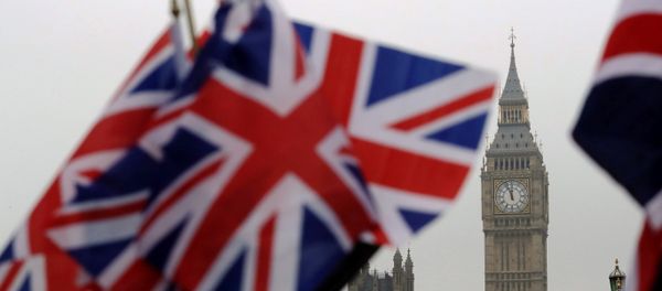 Union flags displayed on a tourist stall, backdropped by the Houses of Parliament and Elizabeth Tower containing the bell know as Big Ben, in London, Wednesday, February 8, 2017. - Sputnik International