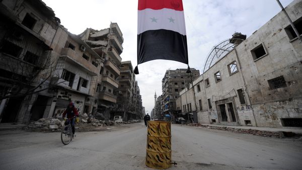 A Syrian national flag hangs in a damaged neighbourhood in Aleppo, Syria January 30, 2017 A Syrian national flag hangs in a damaged neighbourhood in Aleppo, Syria January 30, 2017 - Sputnik International